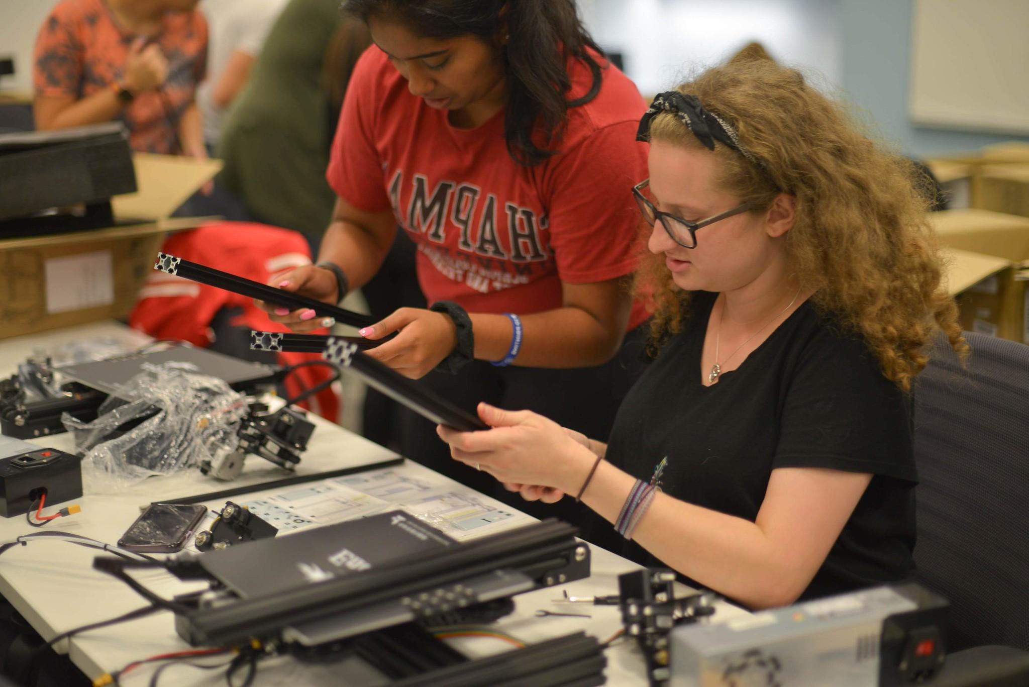 Chapman University students build a 3D printer. 