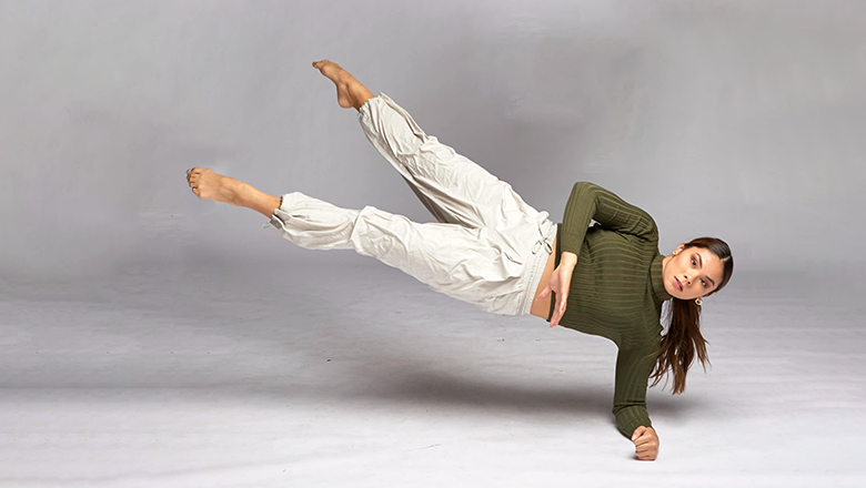 dancer in elbow hand-stand